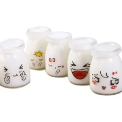 Honningkrukker>glas buddingkrukke med yoghurt, 10 stk. 100 ml søde ansigter med PE-låg, velegnet til marmelade, honning, bryllupsgave