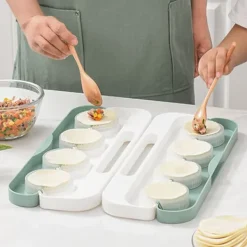Kompakt manuel dumplingmaskine med ergonomisk håndtag - pladsbesparende design, grøn Discount