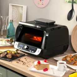 Varmluftsfrituregryde med grill, tilbehør og opskriftsbog InnovaGoods Fryinn 12-in-1 6000 Sort Stål 3400 W 6 L