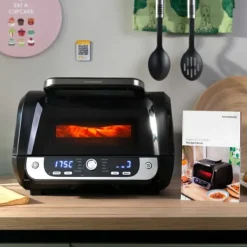 Varmluftsfrituregryde med grill, tilbehør og opskriftsbog InnovaGoods Fryinn 12-in-1 6000 Sort Stål 3400 W 6 L